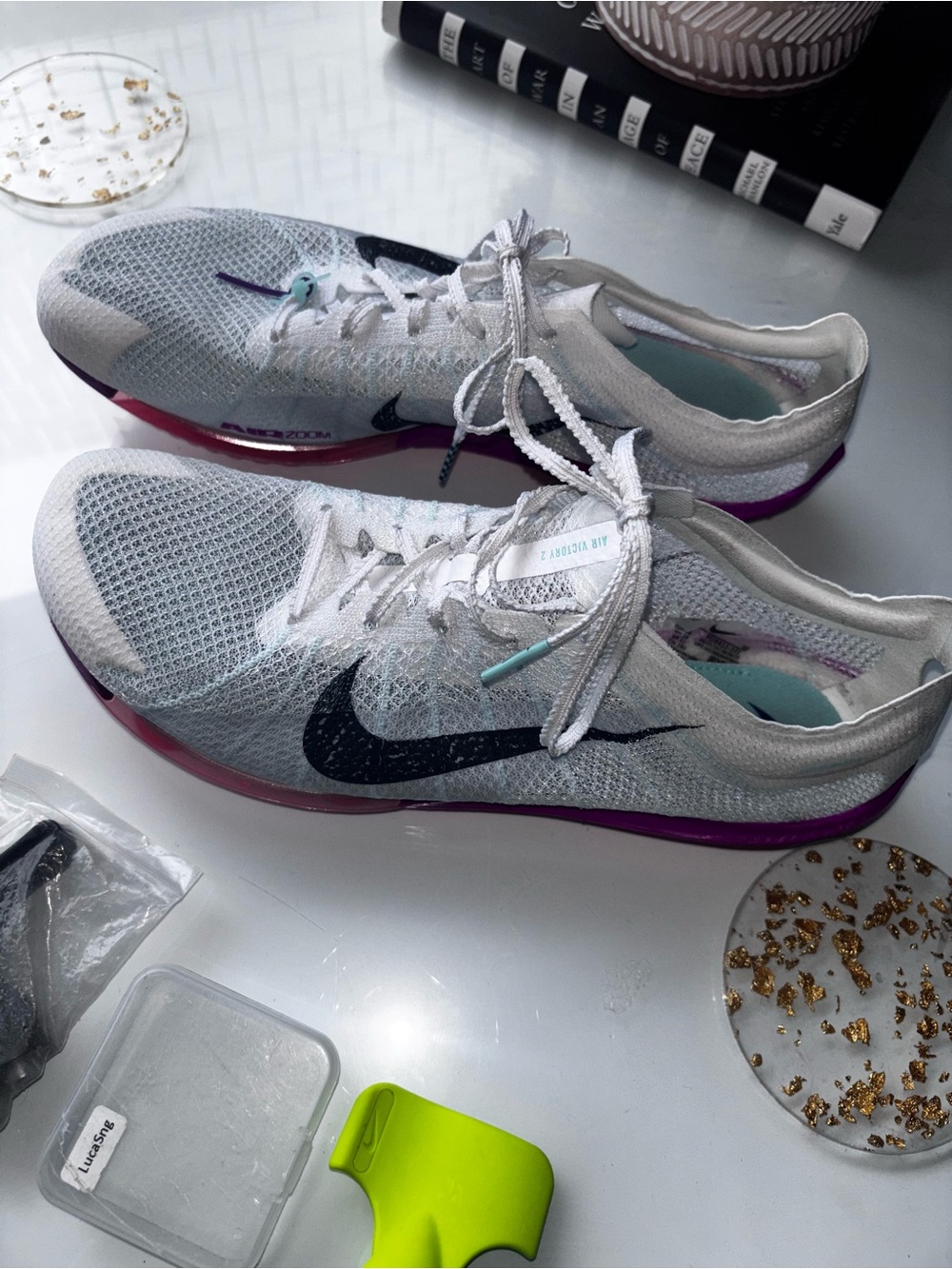 Nike Men’s Athletic Shoes in White with Black Swoosh and Purple Accent